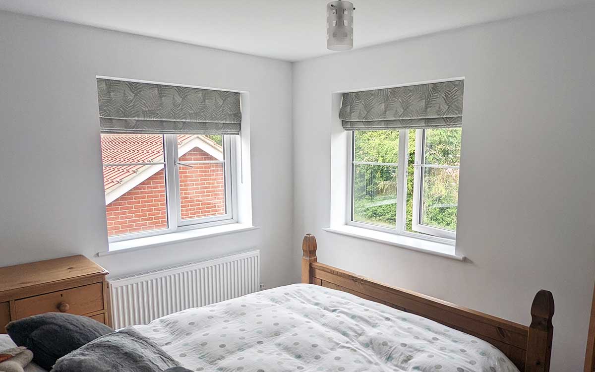 Roman blinds on dining room windows