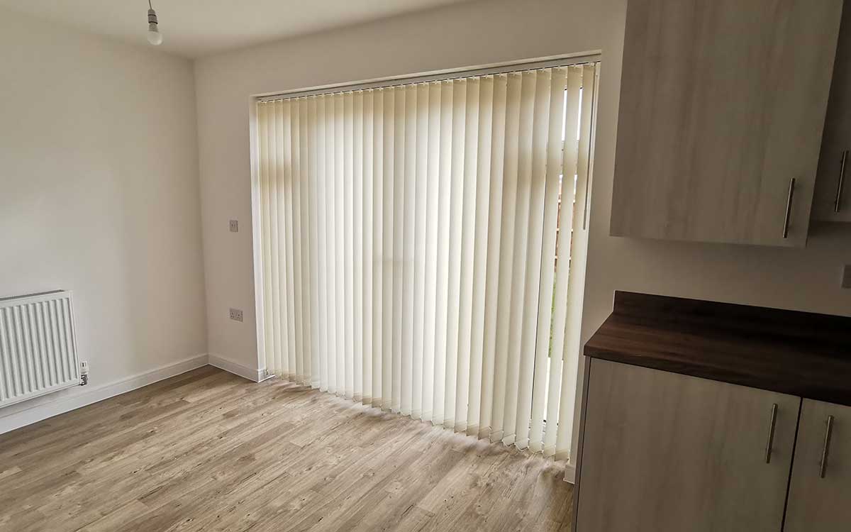 Vertical blinds fitted on a patio door